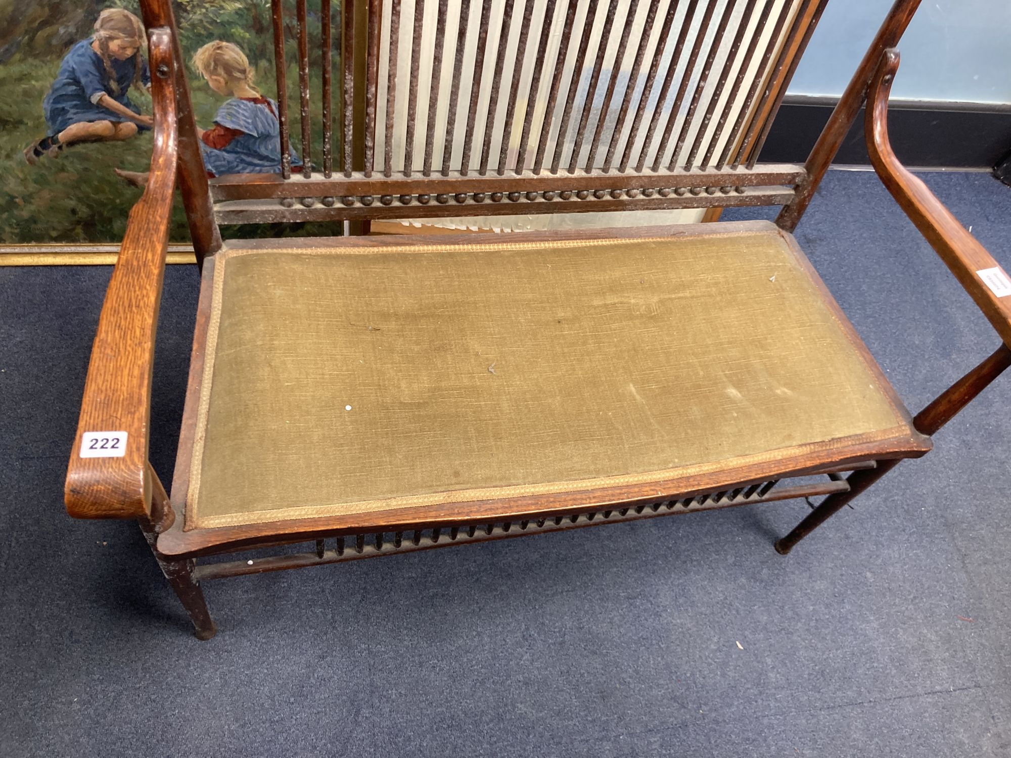 An early 20th century oak two seater chair back settee, width 100cm, depth 50cm, height 99cm